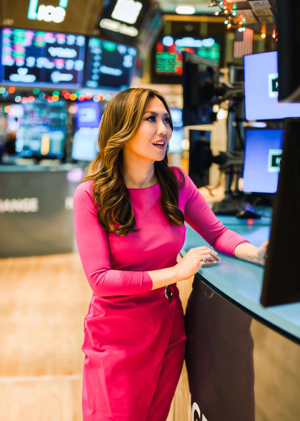 Remy Blaire in profile at a trading desk on the New York Stock Exchange floor